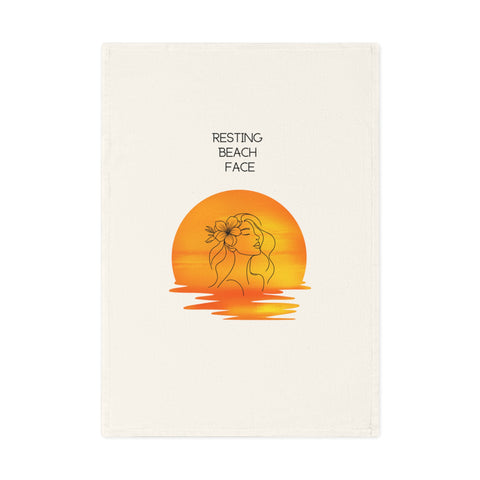 Resting Beach Face - Organic cotton tea towel with serene sunset and hibiscus line art for beach lovers.